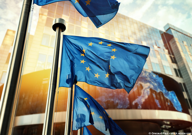EU flags waving in front of European Parliament building [© Grecaud Paul - stock.adobe.com]